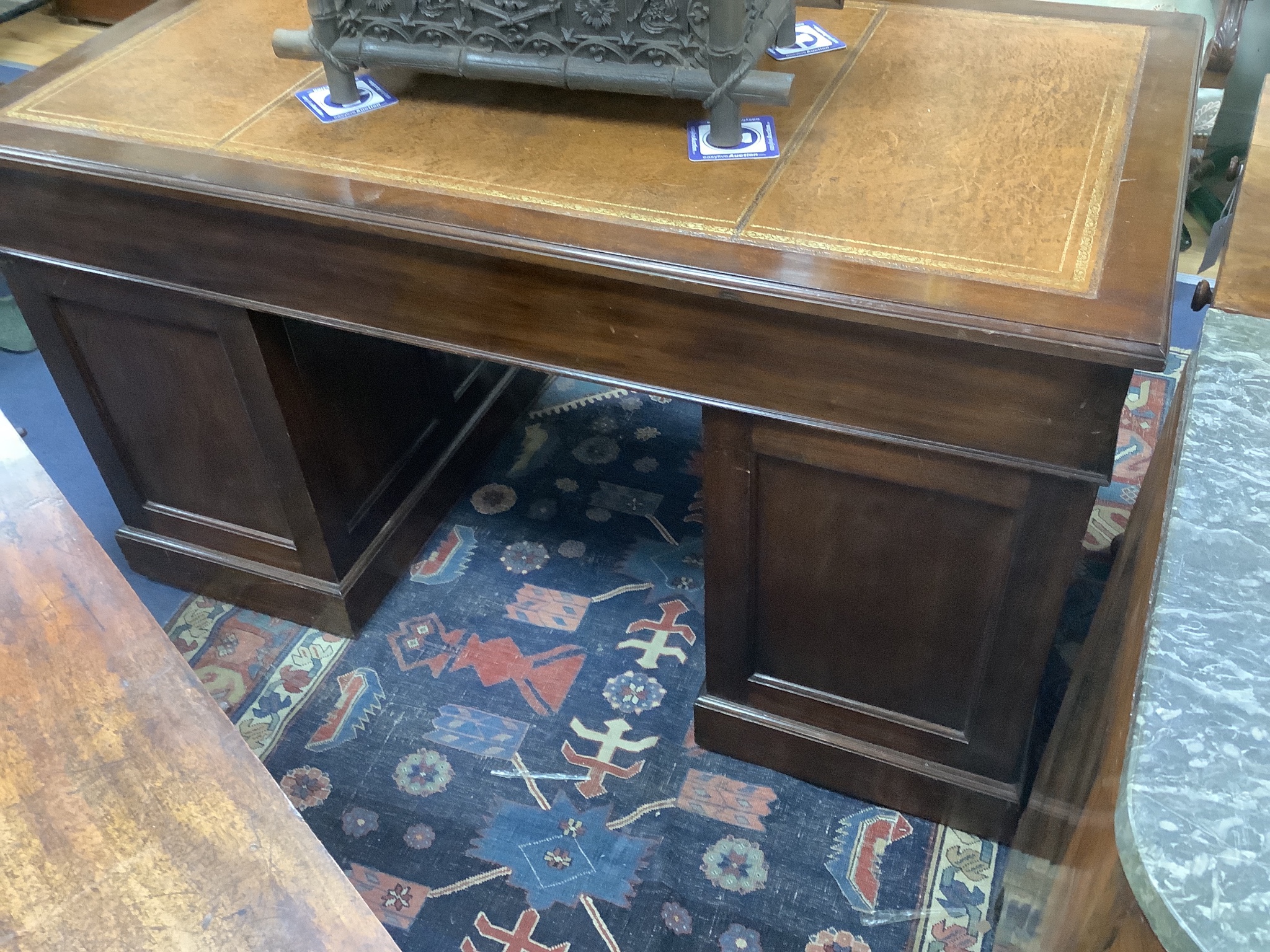 A Victorian mahogany pedestal partner's desk, length 152cm, depth 98cm, height 78cm